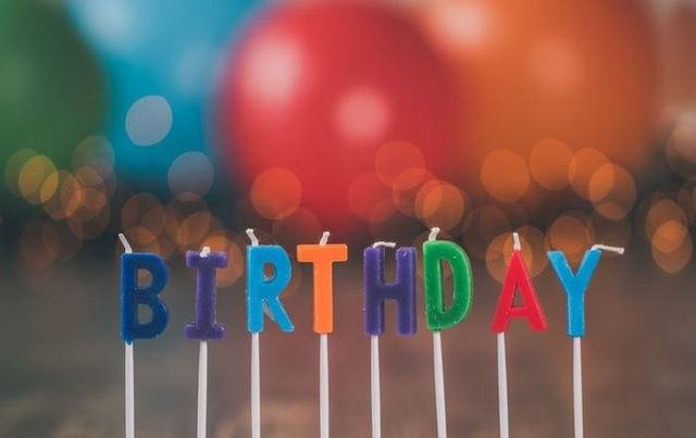 Balloon backdrop styled for a birthday