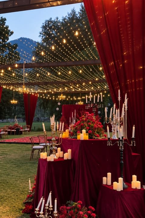 Red velvet table with candelabras and candles